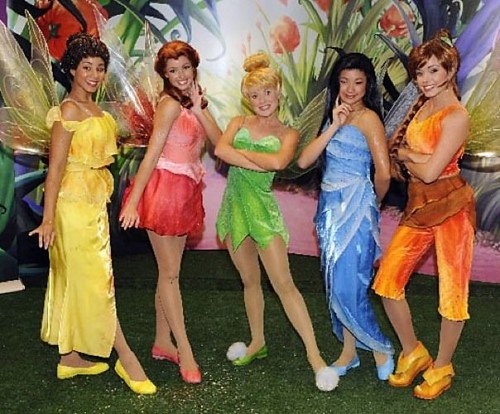 The Magic Kingdom's newest attraction -- Pixie Hollow -- features Iridessa (from left), Rosetta, Tinker Bell, Silvermist and Fawn. The Disney Fairies are a new set of characters, developed for books, movies, Internet games and merchandise.